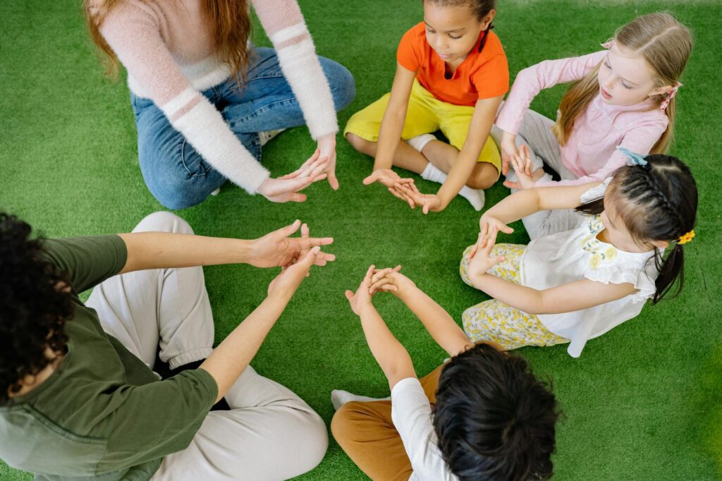 pexels-photo-8613366-8613366 Preschool Children Doing Hand Exercise With Teachers